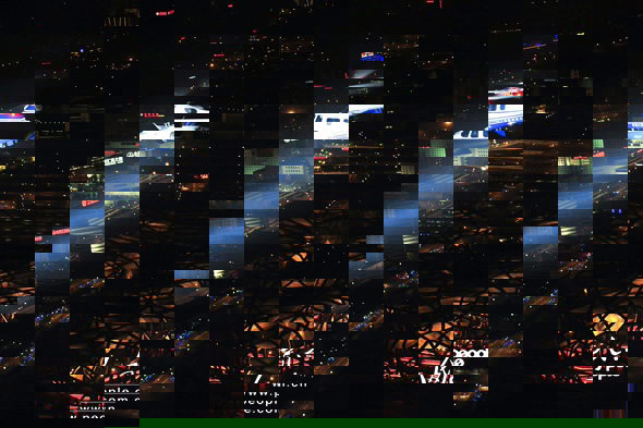 2012年1月22日晚，北京市公安局警用直升机在空中执行除夕安保任务。 图片：北京市公安局